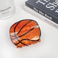 Kreative Haarspange in Basketballform mit orangefarbener Marmorierung und schwarzen Linien - 6cm / Basketball