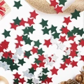 Mix of red, green, and silver star confetti scattered with Christmas decor accessories - Christmas Red Green Silver Pentagrams (ai-100 Pcs/Pack)