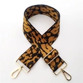 Detailed close-up of 5cm leopard print bag strap with golden metal lobster clasps - Yellow Brown