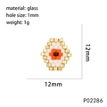 Macro detail of rhombus evil eye beaded pendant with dimensions and 1mm hole size - P02286 Orange White Black Gold