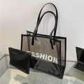 Schwarze semitransparente PVC-Einkaufstasche mit FASHION-Schriftzug und Leder-Innentasche - Schwarz & Weiß