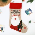 Linen Christmas stocking with Santa Claus applique and knitted red cuff decoration - Santa Claus