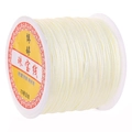 Roll of ivory white No. 72 jade thread for jewelry braiding on a plastic spool - Off-white