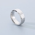 Macro shot of polished silver titanium steel ring with unique hammered metal texture - Steel Color Beveled (8mm)