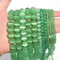Detailed view of green cat-eye stone beads for DIY jewelry making and crafts - Green