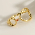 Macro view of creative 14K gold plated glasses ring with red zircon and crystal detail - Large Small Circle Glasses Shape