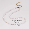 Detail showing 42+5cm length and 5g weight of vintage pearl heart chain necklace - Oval Pearl Style