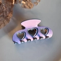 Detail of lavender heart cutout hair claw clip showing glossy acetate finish and texture - Purple Heart