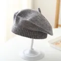 Classic grey knitted beret for children featuring a soft texture and top stem detail - Gray