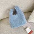 Detail of light blue faux shearling tote bag with blue and white plaid lining fabric - Gray Blue