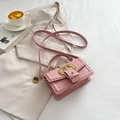 Pink minimalist crossbody square bag with golden baroque lion buckle and leather texture - Pink