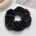 Plush black faux fur scrunchie with high elasticity for elegant hair styling - Black
