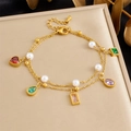 Detail of gold double-layered bracelet with colorful gemstone charms and white pearls - Double Layer Pearl Colorful Irregular Stone Style (B1778)