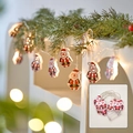 Warm white LED Christmas string lights with Santa Claus pendants and battery box - Iron Painted Santa Claus