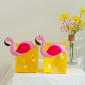 Close-up of inflatable flamingo arm floats in yellow and pink for children swimming - Flamingo Arm Bands
