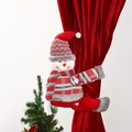 Detailed view of a festive snowman plush curtain tieback holding a red velvet curtain - Snowman Style / Snowman Curtain Buckle
