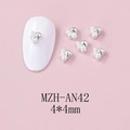 Detailed macro view of 4mm silver flower nail charms with pearls on pink background - Pearl Floral Style (AN42)