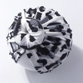 Detail of baby leopard print knotted headwrap showing soft pleated texture and top knot - Style D (Grey Leopard)