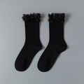 Black mid-calf ribbed knit socks with double-layer mesh lace ruffle trim - Black
