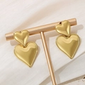Elegant 18K gold plated stainless steel double heart drop earrings on jewelry stand - Double Heart Gold Stitching Earrings (KE110548-WGJD)