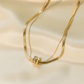Collar de capas en acero de titanio dorado con círculos entrelazados y circonita blanca - Dorado
