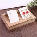 Bamboo earring display stand with 36 slots, featuring wood base and white card holders - 2 Slots - White PU