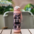 Pink cartoon ninja style water bottle with straw and pink strap on wooden table - Solid Pink