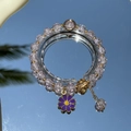 Elegant beaded bracelet with purple floral pendant and crystal beads on a mirror surface - S060-purple Daisy Bracelet #sz535