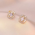 Elegant gold earrings with emerald-cut clear zircon stone surrounded by a sparkling halo - Rectangular Halo Zirconia Style (E0476)