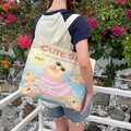 Large beige canvas tote bag with cute seal print and comfortable shoulder straps - Cozy Seal