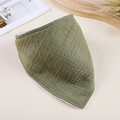 Close-up of olive green double-layer crepe cotton baby bib featuring soft muslin texture - Army Green