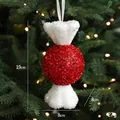 Sparkly red and white ball candy Christmas tree ornament hanging with a white ribbon - Large Candy Style (28g)
