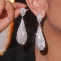 Luxurious silver drop earrings with shimmering crystals for an elegant evening look - Classic Silver