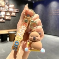 Cute Capybara keychain on a scooter with colorful embossed wrist strap and gold hook - B199-6 Skateboard