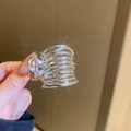 Elegante pinza per capelli in metallo argento con design a spirale multistrato da donna - Clip per Coda di Cavallo Geometrica a Croce Argento