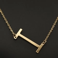 Elegant gold-plated alphabet 'I' pendant necklace on a delicate O-shaped chain - Gold I