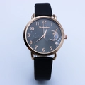 Orologio da donna con quadrante cielo stellato, cassa in oro rosa e decoro luna e stelle - Nero