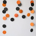 2-meter Halloween paper garland with alternating matte black and orange glitter circles - 2m Halloween Circle Garland Black & Rose Gold