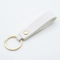 Minimalist white PU leather keychain with gold metal ring and rivet for elegant style - White & Gold (Single)