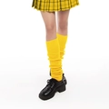 Vibrant yellow knit loose socks for women styled with black shoes for a chic look - Yellow