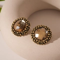 Macro detail of vintage round stud earrings with amber stone and beaded gold trim - Gold Round Flower Stud Earrings (Silver Needle)