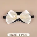 Black silk-like sleep mask featuring a large cream bow and comfortable elastic strap - Black Bow Style