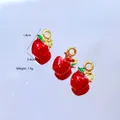 Detailed close-up of cute red apple charms with green leaves and 1.4cm metal hanging loop - Small Apple