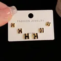Three-pair set of elegant gold-tone H-shaped stud earrings with black enamel and S925 silver needles - Black-H Letter Set (7#)