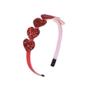 Detail view of red sequin hearts on a pink headband with a smooth silk ribbon wrap - Pure Red Sequined Heart