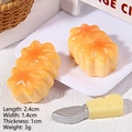 Miniature resin food toy featuring bright ginger yellow cakes and a small cheese knife - Leaf Shaped Bread