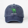 Detailed close-up of a navy washed denim baseball cap featuring a Saudi Arabia camel logo - Adjustable / Navy Blue