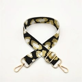 Detail of adjustable leopard print bag strap with golden metallic lobster hooks - Silver Clasp / White