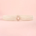 Close-up of pearl waist chain featuring an oval metal clasp with crystals on pink background - 19301 Oval Pearl Buckle