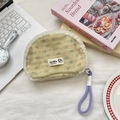 Florale Plüsch-Kosmetiktasche in Gelb mit weißem Webpelzrand und lila Trageriemen - Gelb